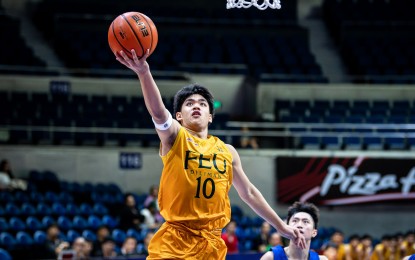 <p><strong>LAYUP.</strong> Anton Lopez of Far Eastern University-Diliman goes for the basket during their game against Ateneo de Manila University in the UAAP Season 87 boys' basketball at Smart Araneta Coliseum in Qyezon City on Saturday (Nov. 30, 2024). The Baby Tamaraws won, 69-55. <em>(UAAP photo)</em></p>
