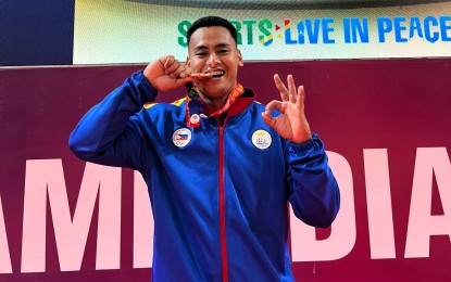 <p><strong>HOPEFUL.</strong> John Dexter Tabique of Cebu won the men's 89kg bronze medal at the 2023 Cambodia SEA Games. He will compete in Singapore next month, aiming for a podium finish. <em>(Contributed photo)</em></p>