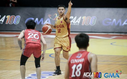 <p><strong>MANGUBAT LIFTS MAPUA.</strong> Mapua University's Lawrence Mangubat (No. 12) is closely guarded by Lyceum's Renz Villegas (No. 20) during the National Collegiate Athletics Association (NCAA) Season 100 men's basketball tournament at the Filoil EcoOil Arena in San Juan on Tuesday (Oct. 29, 2024). The Cardinals won, 69-68. <em>(NCAA photo)</em></p>