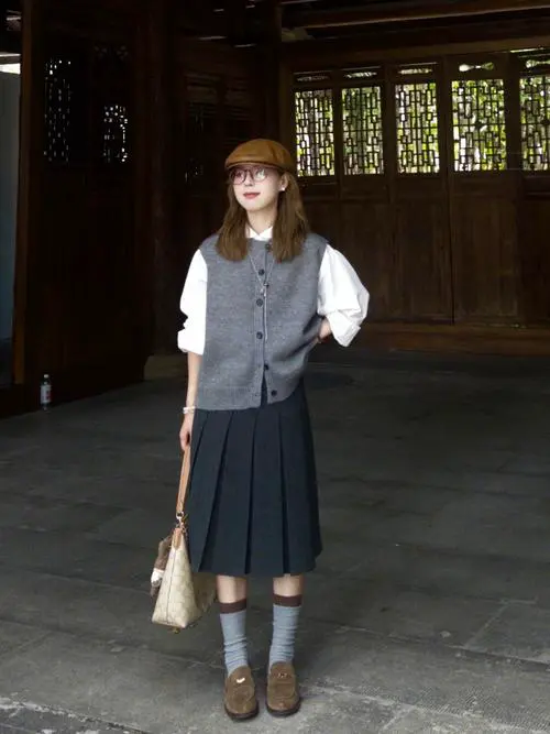 毛衣马甲怎么搭配图片