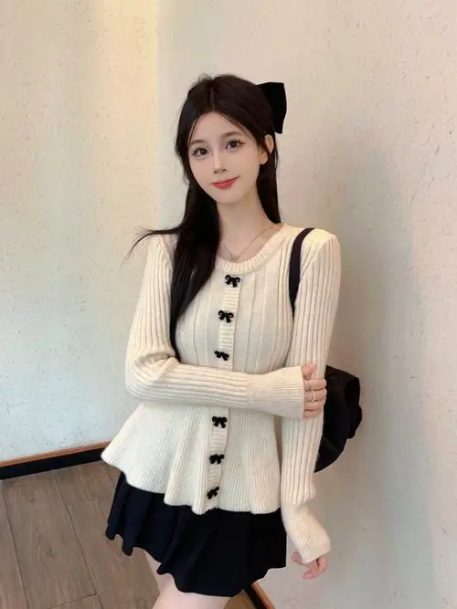 针织衫中长款怎么搭配什么裤子好看图片