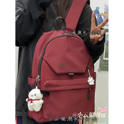 墨绿色双肩包怎么搭配