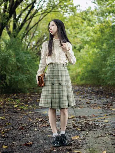 绿色毛呢短裙怎么搭配图片