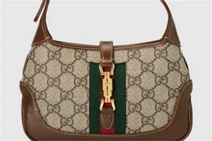 gucci是什么牌子什么档次，古驰包包多少钱一个口红哪个色最火